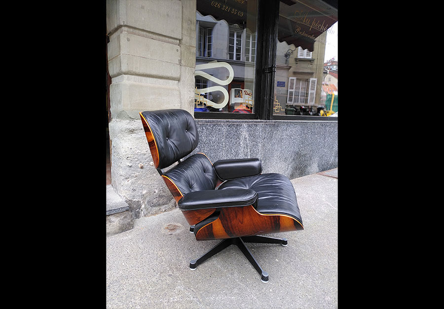 Restauration d'une lounge chair par Charles et Ray Eames édition Herman Miller en palissandre
